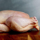 raw chicken on cutting board